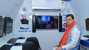 CM Dhami flagged off computer on wheel vehicle. Hillvani News